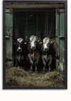 Een groep koeien staat in een slecht verlichte schuur, gezien door een rechthoekige deuropening. De schuur is omlijst met een zwarte rand als een betoverende Cows In A Barn Schilderij van CollageDepot, en hooi ligt voor de koeien op de grond verspreid. Kettingen hangen vlakbij aan het plafond en voegen intriges toe aan deze unieke wanddecoratie.,Zwart-Zonder,Lichtbruin-Zonder,showOne,Zonder