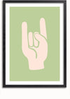 Een ingelijste illustratie toont een hand die het "rock on"-gebaar maakt, met de duim, wijsvinger en pink uitgestrekt. De hand is lichtbeige tegen een pastelgroene achtergrond en het frame is zwart. Dit opvallende Rock On Schilderij van CollageDepot wordt geleverd met een handig magnetisch ophangsysteem voor eenvoudige weergave.